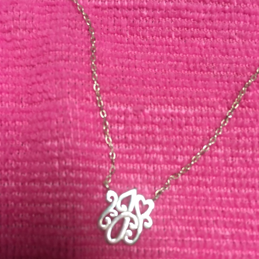 Silver letter “J” necklace